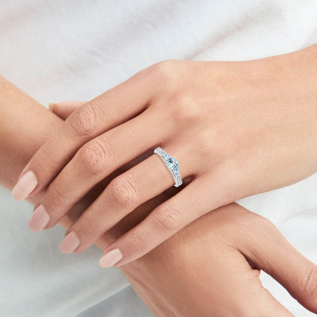 Aquamarine Three Stone Halo Ring